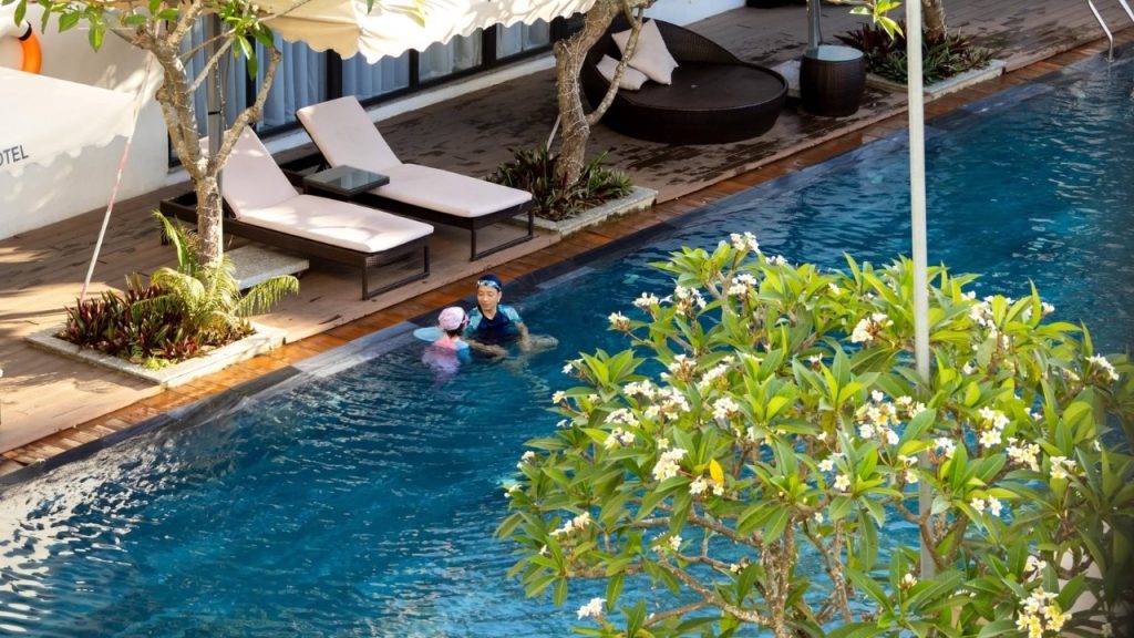 Outdoor swimming pool provides a pleasant relaxing space.