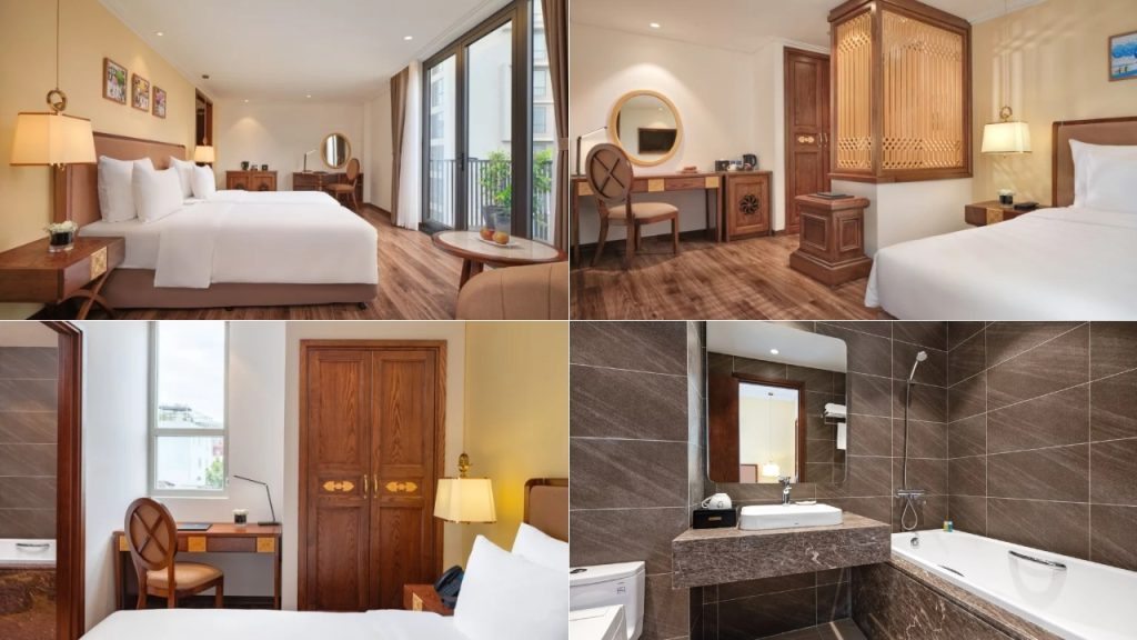 Phòng nghỉ hiện đại với bàn làm việc và tiện nghi lưu trú tại Nesta Hotel & Spa